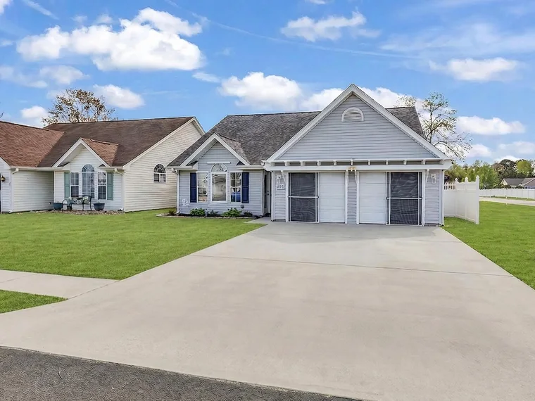 Single-story home with a two-car garage at 544 Mallard Ln, Surfside Beach, SC.